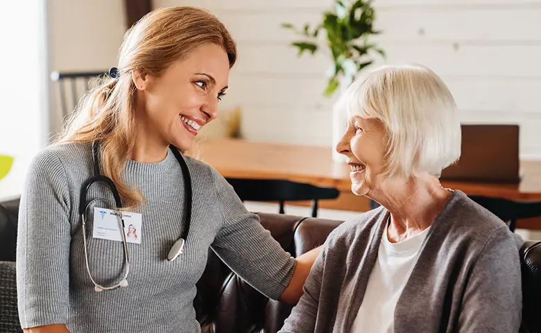 Occupational therapist providing assistance to a patient with daily tasks