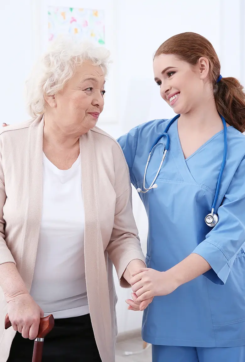 Joyful senior woman receiving compassionate home care services