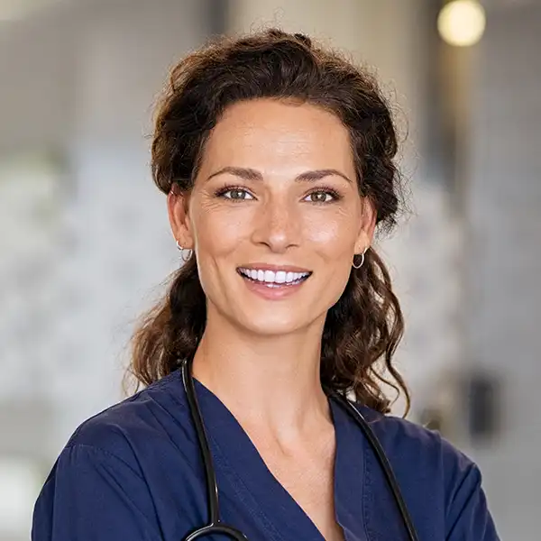 Medical professional preparing infusion medication